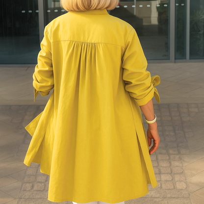 SIMONE™ | SKJORTBLUS MED ELEGANTA ROSETTMANCHETTER